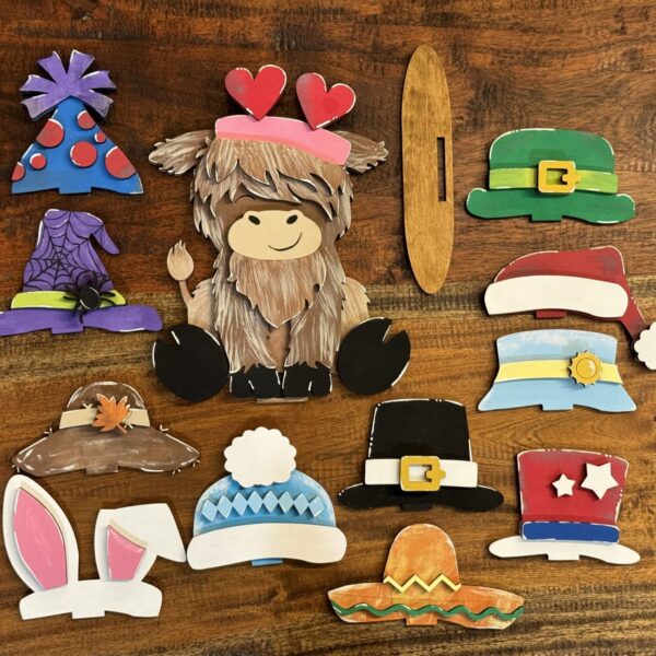 Highland Cow with Interchangeable Hats Table/Shelf Sitter